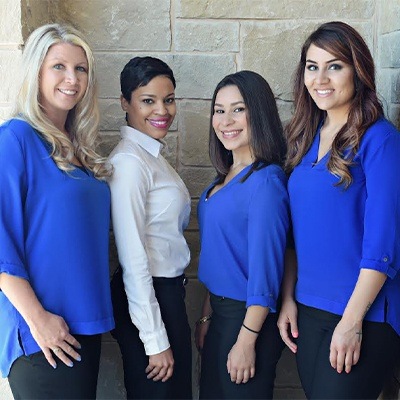 Summer Creek Dentistry team members smiling in Fort Worth dental office