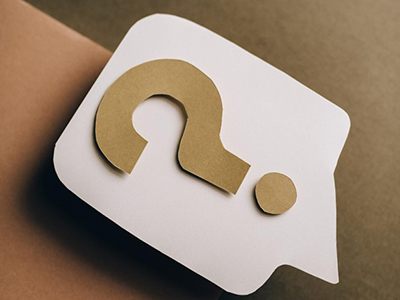 Question mark on paper card