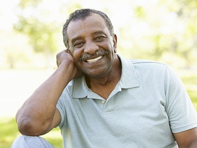 Man smiling outside