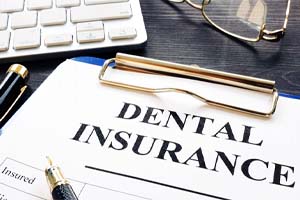 Dental insurance form on table