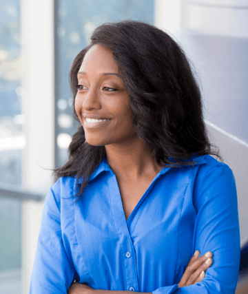 Woman in royal blue shirt smiling