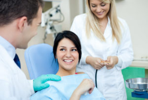 Patient sitting in dentist chair