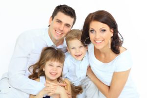 young family smiling
