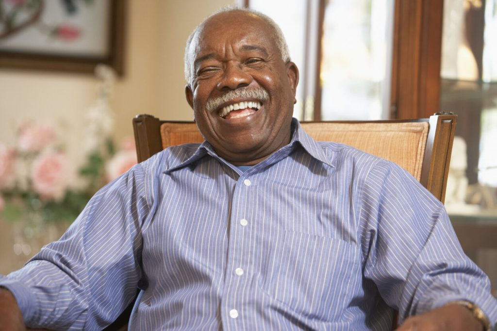 person with dentures in Fort Worth smiling