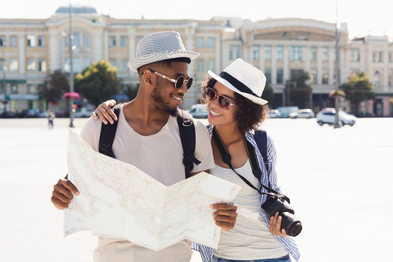 a couple smiling together while traveling