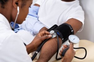 Patient getting his blood pressure checked